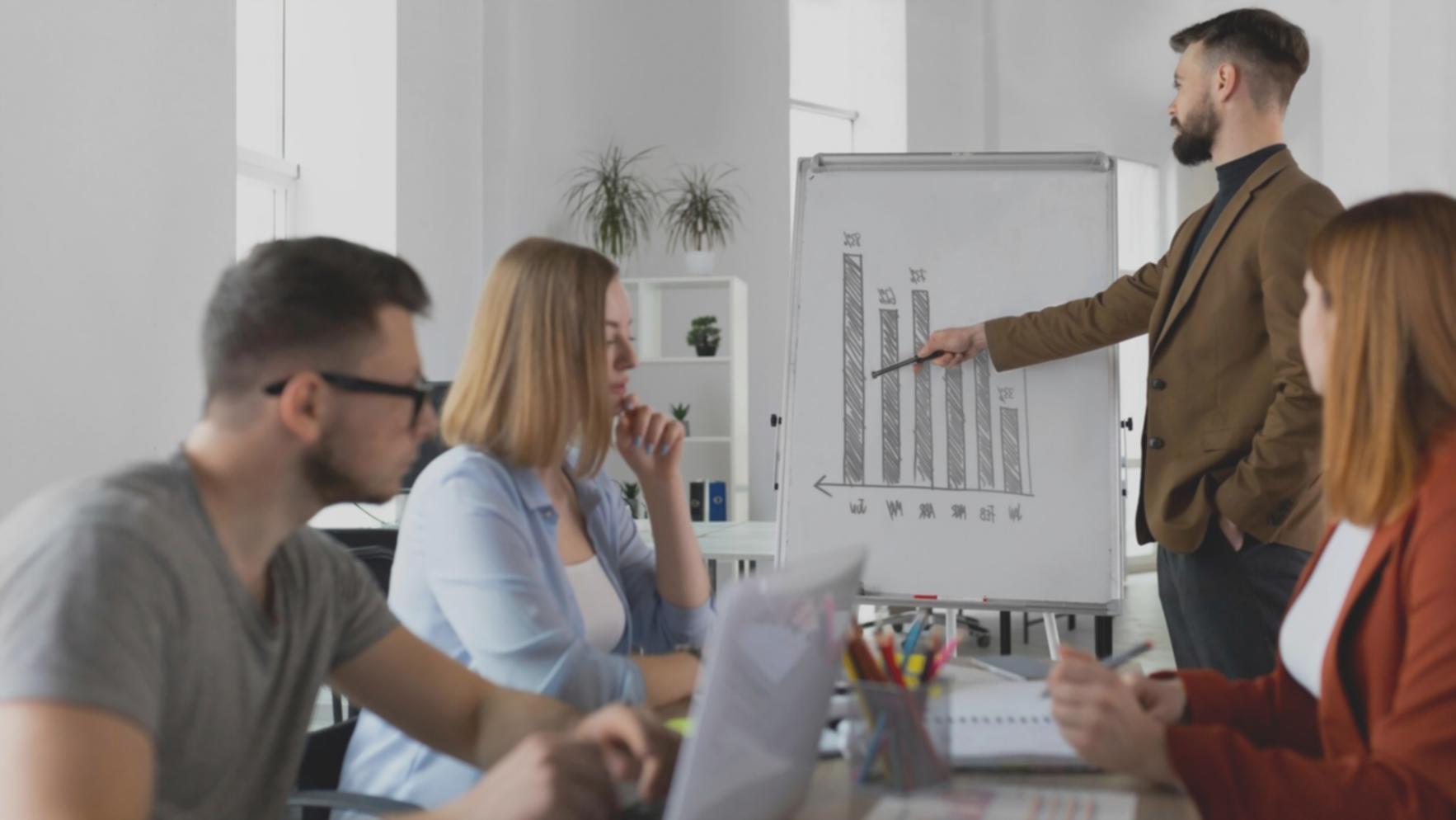 Person reviewing financial documents and planning budget priorities